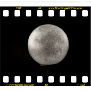 Black and White photograph of a crystal ball by Kirk Decker